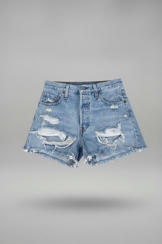 Denim shorts with whale designs on a gray background